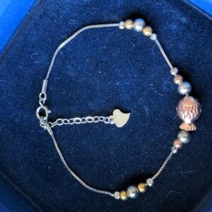 Like new 14K gold vermeil bracelet with fish bead, tropical